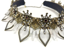 Load image into Gallery viewer, Close up of the individually threaded antique gold petals that give the crown a sunburst or sunflower silhouette