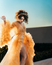 Load image into Gallery viewer, Gorgeous woman at sunset in orange ruffled dress posing with voluminous dark curls and the Amunet heapiece