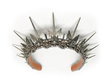 Load image into Gallery viewer, Aero is a silver headpiece with 3 inch spikes, titanium, quartz crystals and sparkling rhinestones intricately placed throughout silver filigree.
