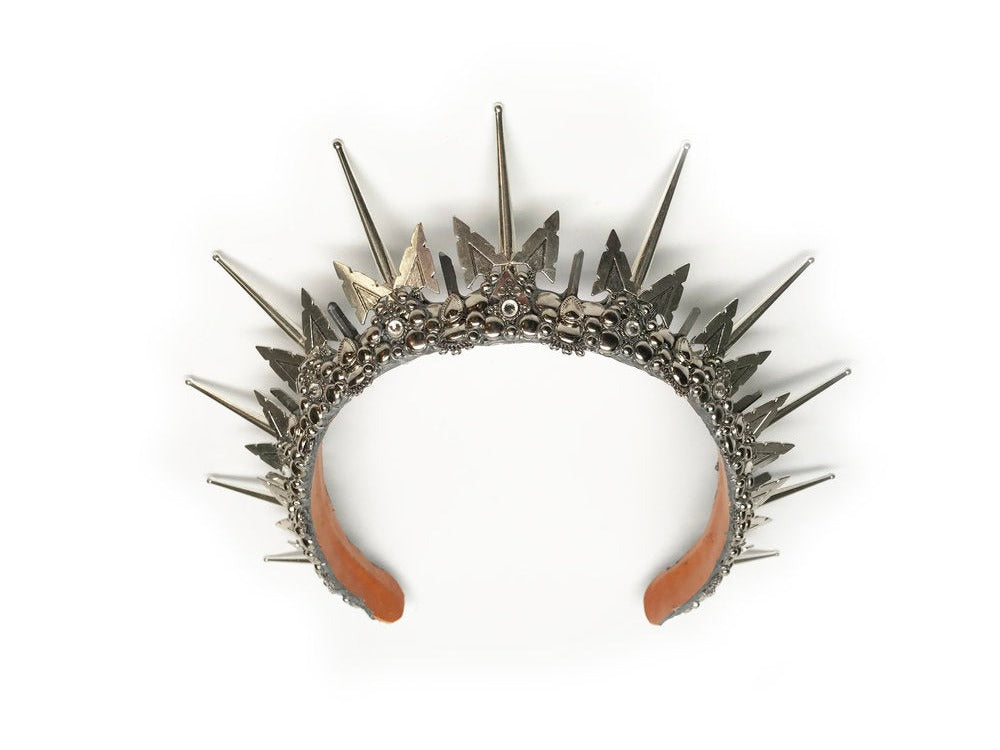 Aero is a silver headpiece with 3 inch spikes, titanium, quartz crystals and sparkling rhinestones