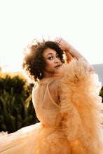 Load image into Gallery viewer, Woman at sunset in a ruffled orange gown wearing the Amunet crown with loose dark curls
